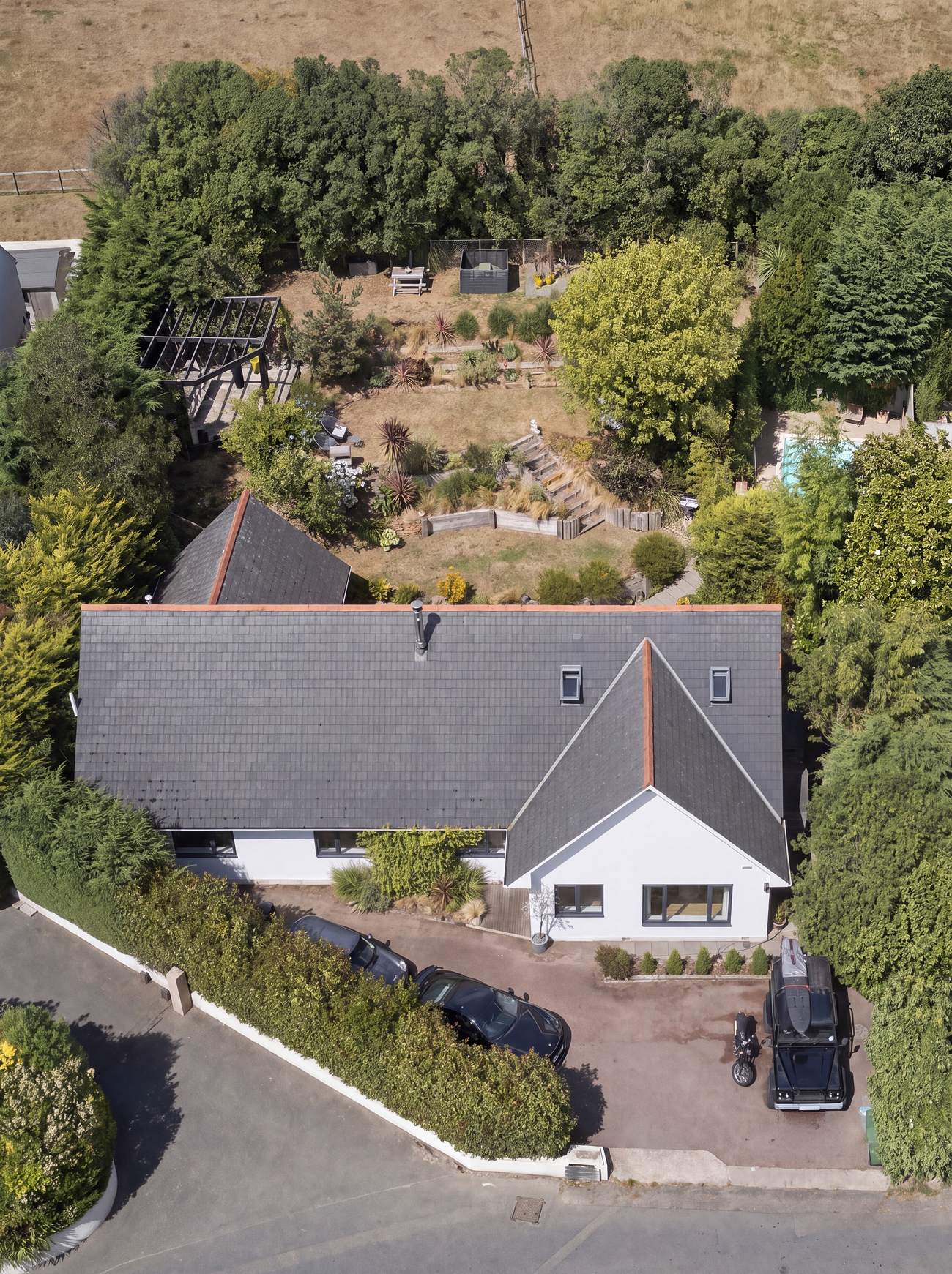 St Omer from above: the house and drive at the front, the terraced garden, pergola and pool behind
