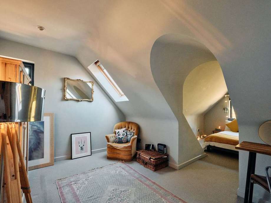 Bedroom 4 with its curved walls and skylight
